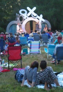 Audience relaxing, enjoying A MIDSUMMER NIGHT'S DREAM